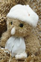 Мягкая игрушка Сова Лия темная, 24 см в белом шарфе и шапке ушанке, 08184C24-25-43