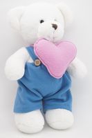 Мягкая игрушка Мишка Аха белоснежный, 33 см с розовым сердцем и в голубом комбинезоне, 0913333S-33-63