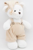 Мягкая игрушка Мишка Аха белоснежный в бежевых комбинезоне и колпаке с кисточкой, 33 см, 0913333S-57-64